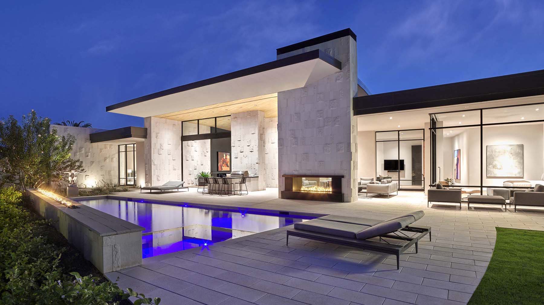 Stone Radius Modern Luxury pool/patio at dusk